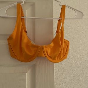 Cuup orange swimsuit. The top is a size 10/34DDD and bottoms are a size 2.